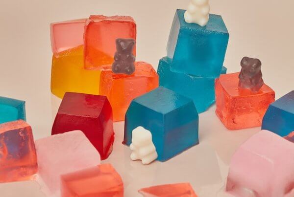 cbd gummy bears on top of cbd gummy squares