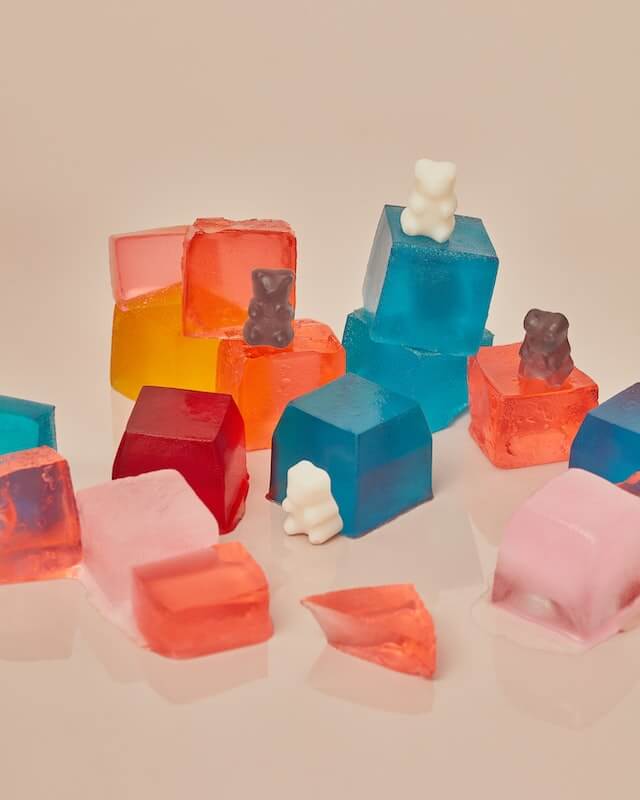 cbd gummy bears on top of cbd gummy squares